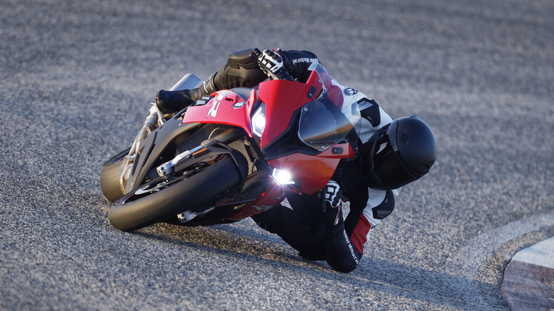 Front view of BMW S1000RR cornering at speed