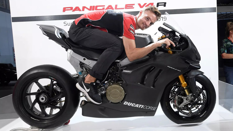 Rider on the Ducati Panigale V4 R at a motor show