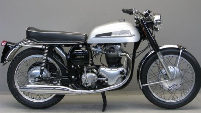 1962 Norton 650SS motorcycle on a gray background