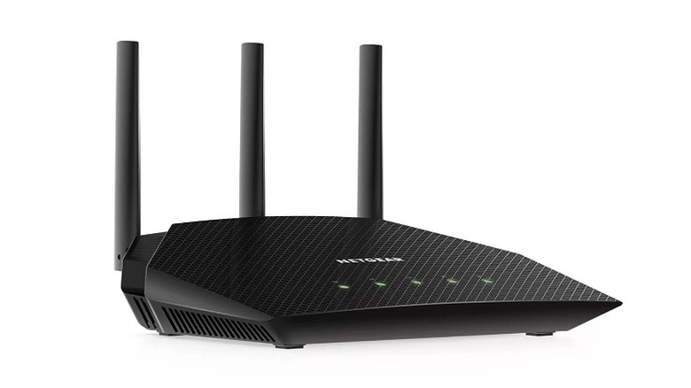 Black Netgear router with three antennas