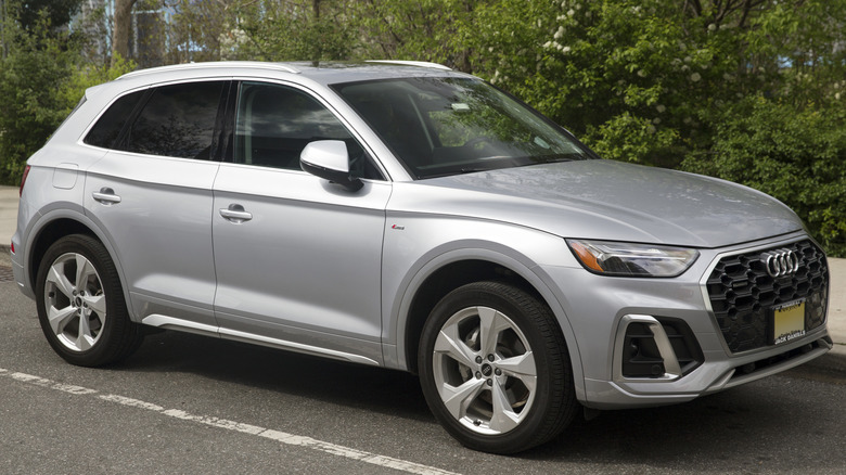 A silver 2022 Audi Q5 compact luxury SUV parked on a street.