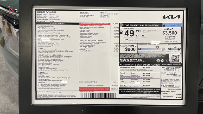 A photo of a vehicle window sticker at a dealership