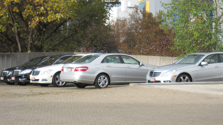 Several cars in a parking lot
