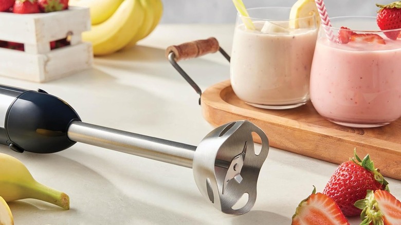 Immersion blender and smoothies on counter
