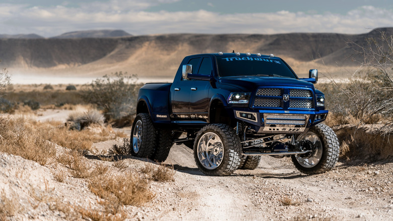 A lifted Dodge truck offroading