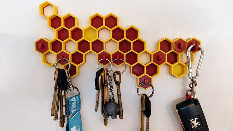 Honeycomb style key holder with keys
