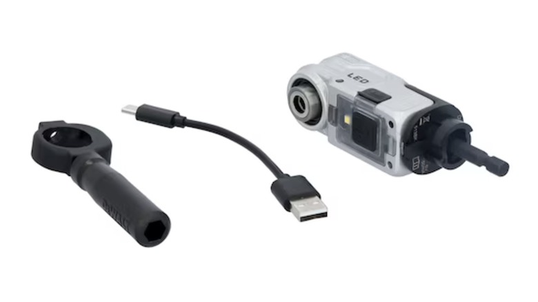 A DeWalt right angle drill attachment and its USB charging cord