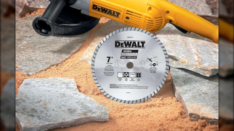 A 7-Inch DeWalt grinding wheel next to an angle grinder