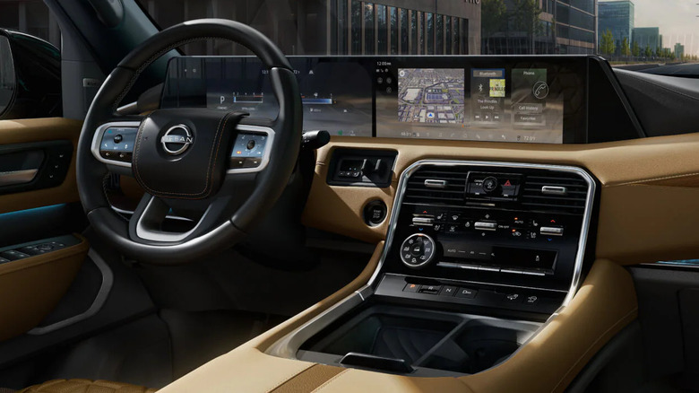 A view of the dashboard of the 2026 Nissan Armada from behind the passenger seat.