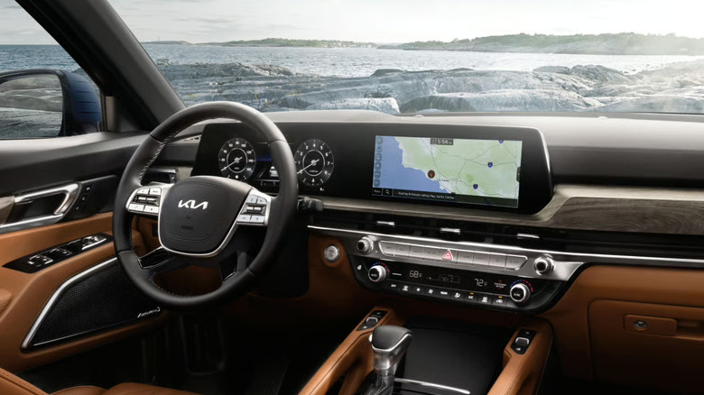 The tan and black interior of the 2025 Kia Telluride, photographed from the passenger seat.