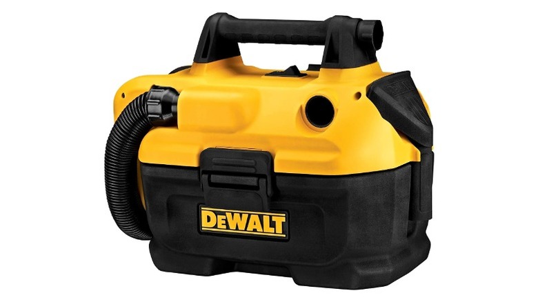 DeWalt portable vacuum with a thick black hose