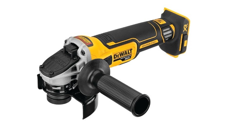 Angle grinder with an extra handle on the side