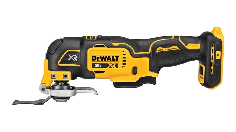 Cordless multi-tool with a silver lever and blade