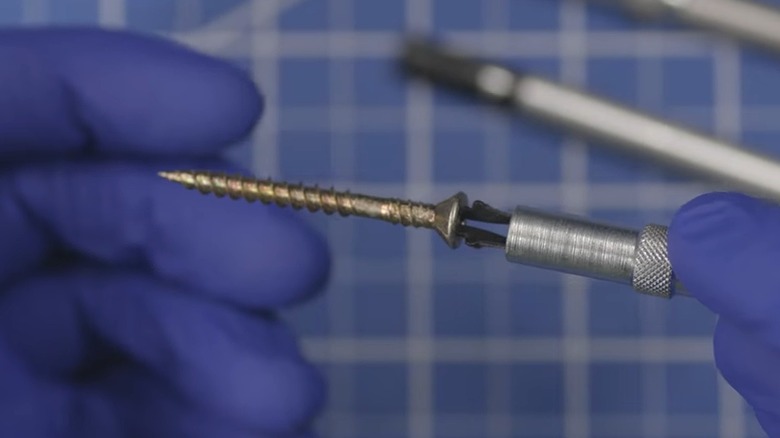 Close up of screw starter and screw