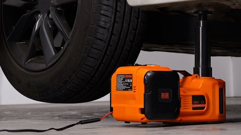 Vevor Five-Ton Electric Car Jack lifting a car