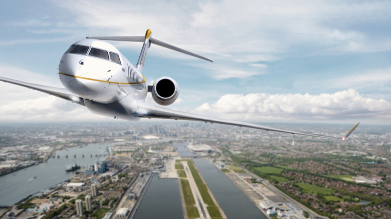 A Bombardier Global 8000 taking off from London City Airport