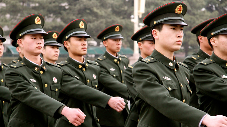 Chinese soldiers marching at Tiananmen Square