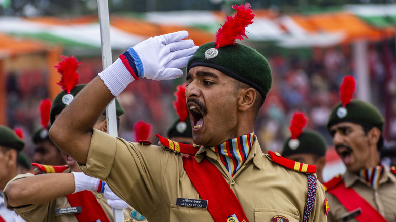 Indian military members marching during a parade