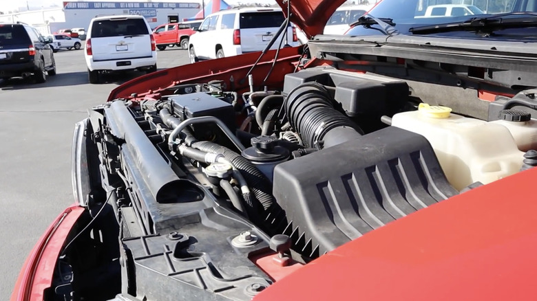 Ford 6.2-liter Boss V8 in  red 2014 F-150 Raptor