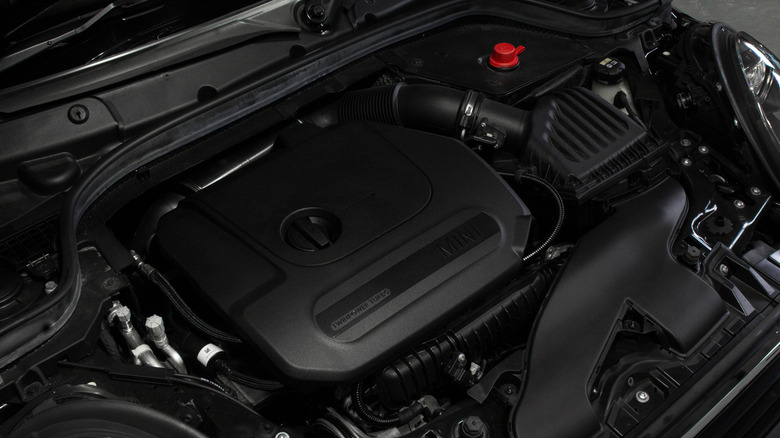 A BMW/Mini 1.5L 3-cylinder engine under the hood.