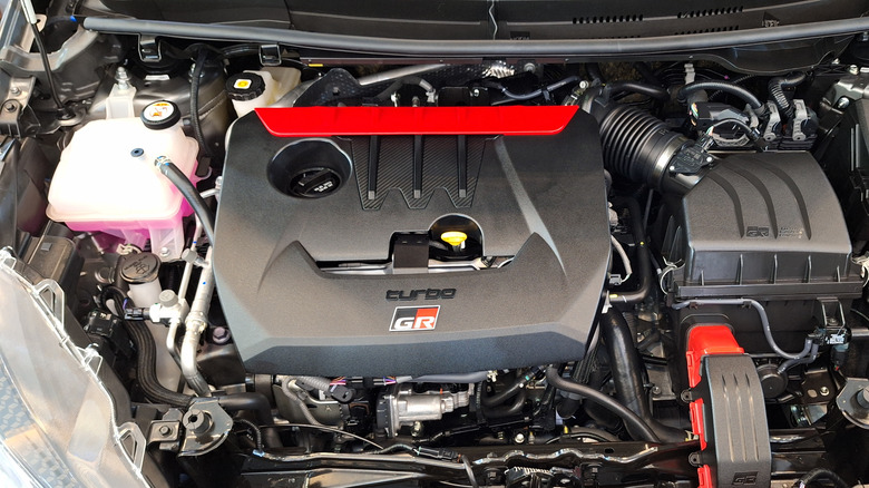 A Toyota GR Yaris 3-cylinder engine under the hood.