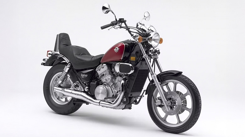 A side view of the red and black Kawasaki Vulcan 750