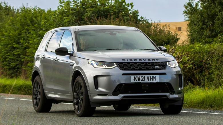 silver Land Rover Discovery parked on roadside
