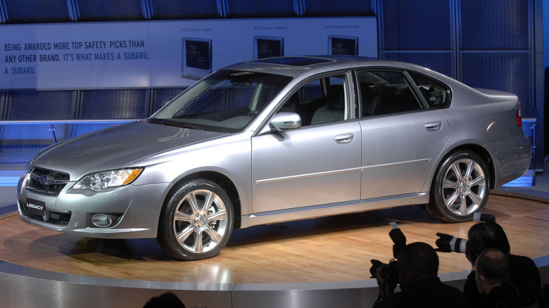 A fourth-generation Subaru Legacy at an auto show,