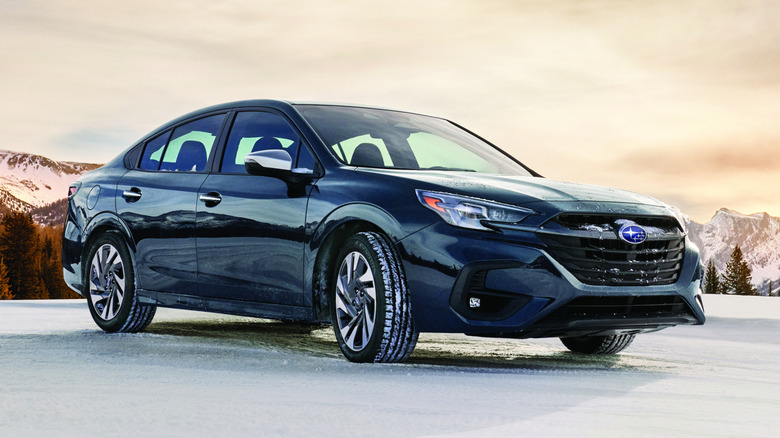A 2025 Subaru Legacy parked on a snow-covered surface.