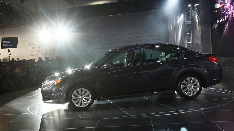 A 2010 Subaru Legacy at an auto show.