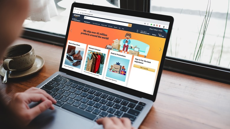 A person opening Amazon on their laptop