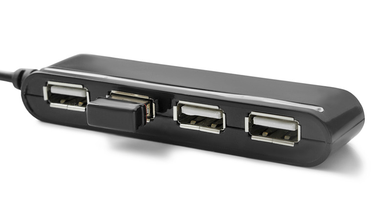 A four-port USB hub against a white background.