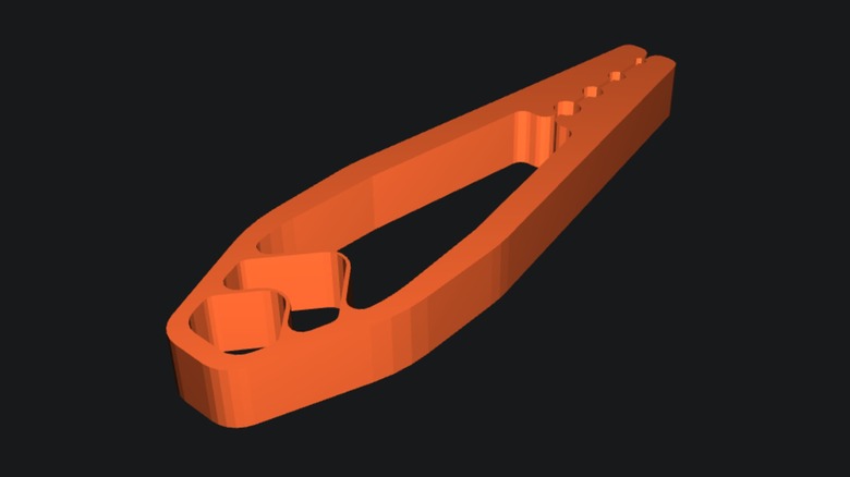 A 3D rendering of an orange nail holder tool.