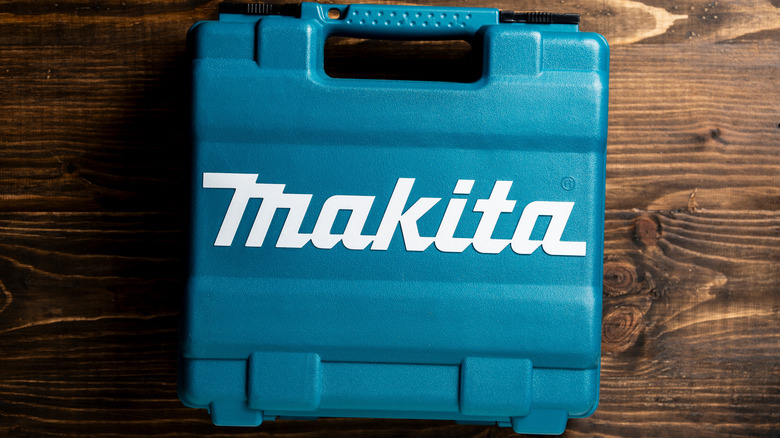 The Makita logo on a tool.