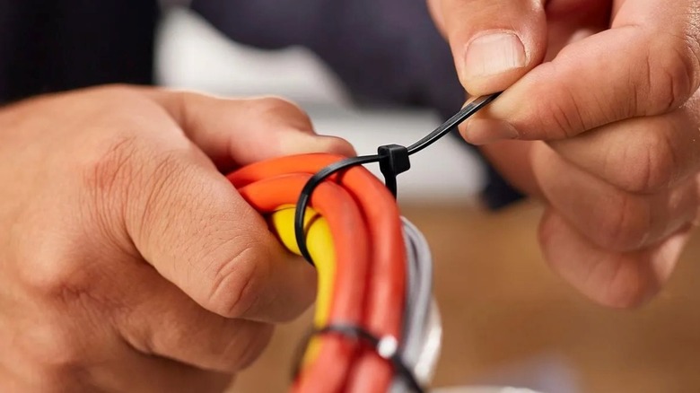 Using a Storehouse cable tie to secure a bundle of wires.