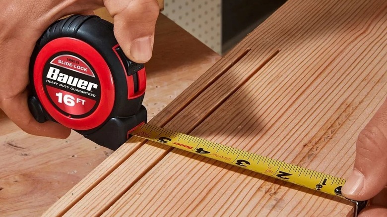Using the Bauer 16-foot tape measure on a woodworking project.