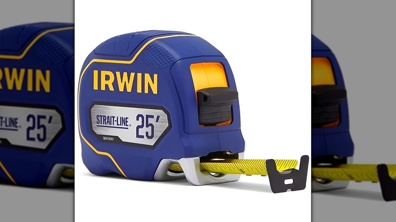 Irwin 25' tape measure with blade extended on white background