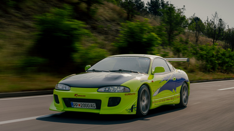 Fast And Furious Mitsubishi Eclipse replica on the move, front 3/4 view