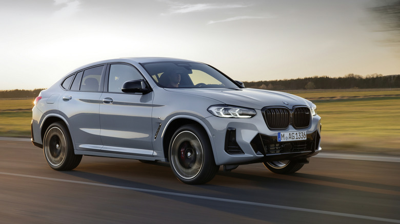 BMW X4 being driven on a runway