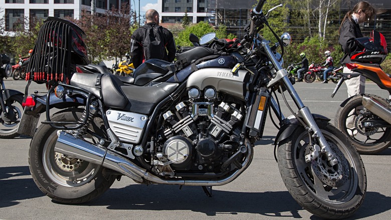 Yamaha V-Max motorcycle in black and silver color. View from the right.
