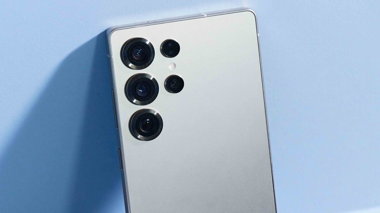 Rear of Samsung Galaxy S25 Ultra against a wall.