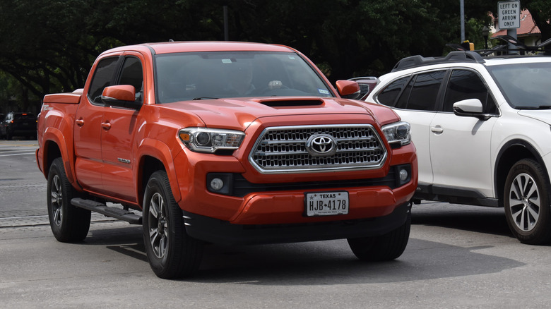 Front view of orange Toyota Tacoma