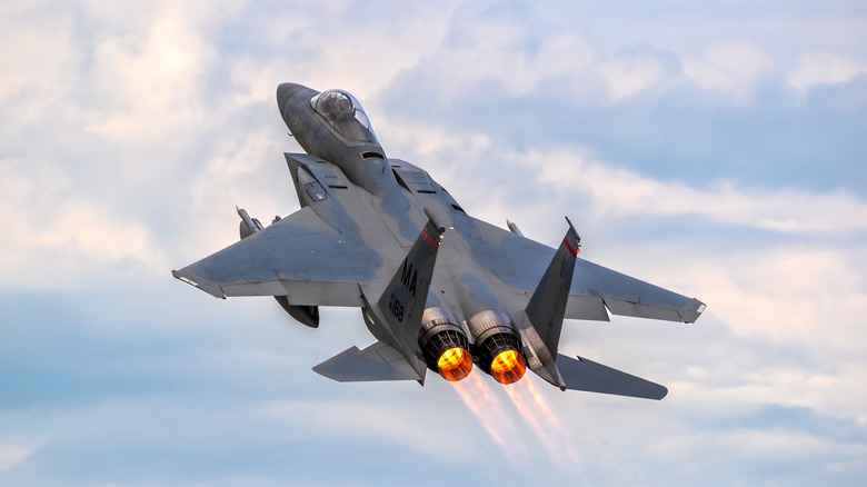 An F-15 from the C-series taking off from an air force base