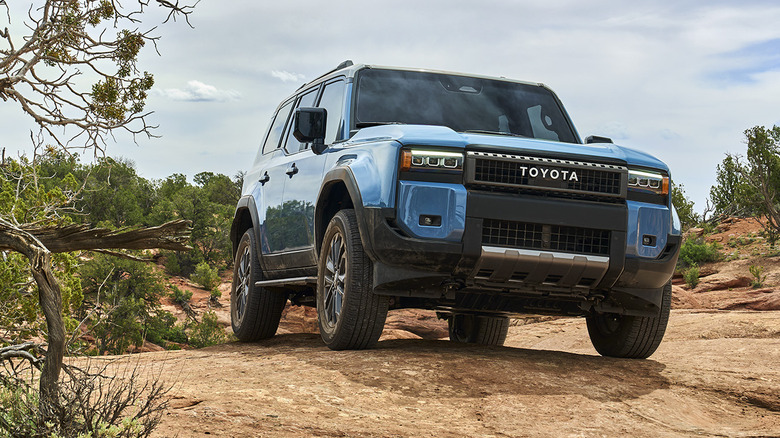 Blue 2026 Toyota Land Cruiser in mountains
