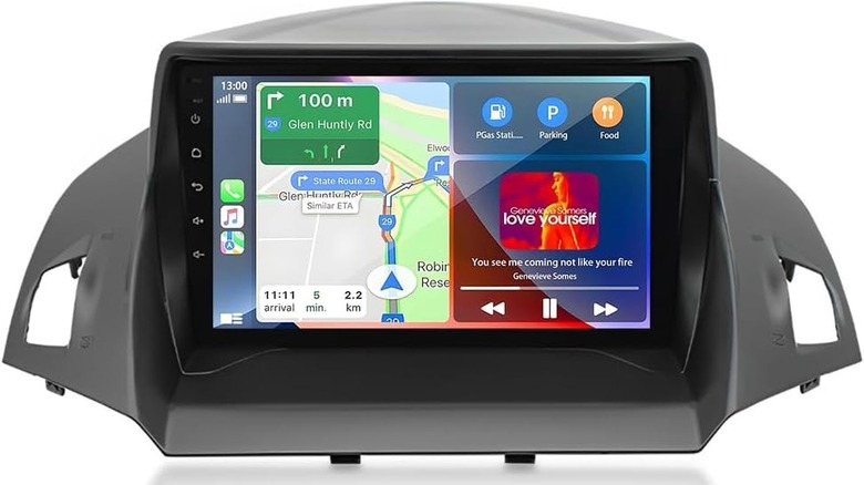 A car stereo system package with a head unit showing directions and a song.