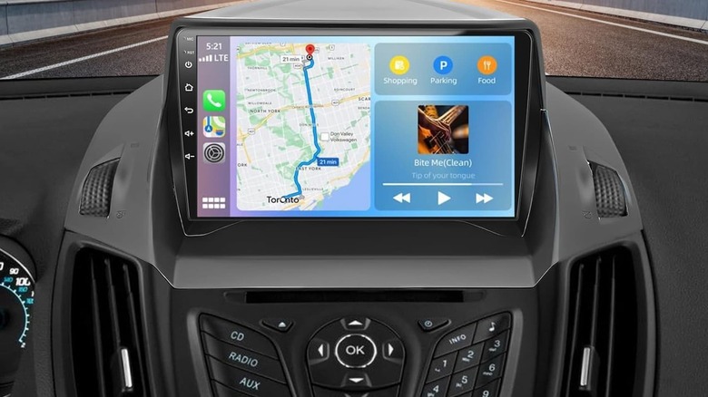 A car dashboard with navigation and music.