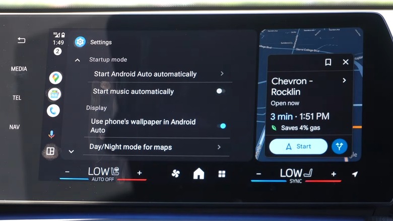 The Start music automatically option in Android Auto settings in a car's infotainment system