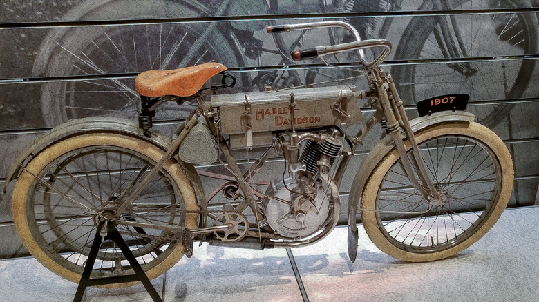 1907 Harley Davidson "Strap Tank" on stand at museum, right-side view