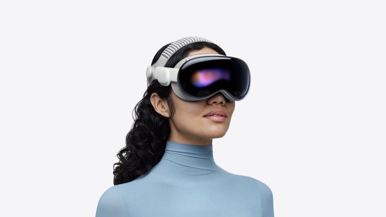 Person wearing Apple Vision Pro on white background