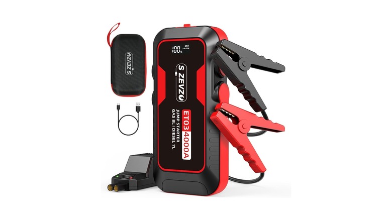 A black and red car battery jump start device